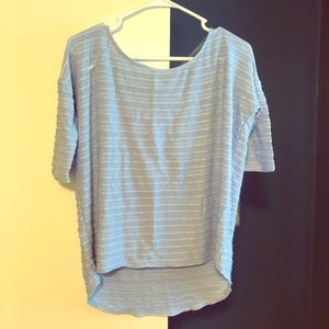 Francesca’s blue drape hi-low hem blouse